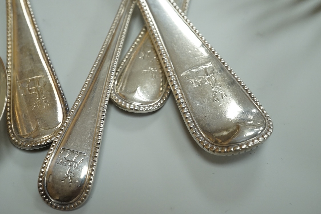A harlequin part canteen of late Victorian and Edwardian silver beaded Old English pattern flatware, various dates and makers, comprising thirty items, 55.8oz.